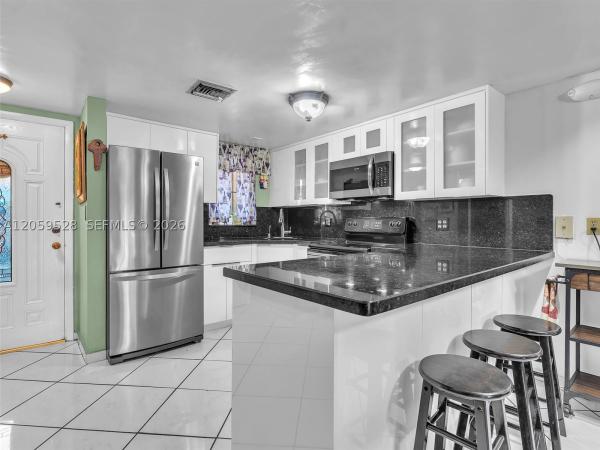 Vista Alegre Townhomes, 5530 W 26th Ct #102, Hialeah, Florida 33016, image 1