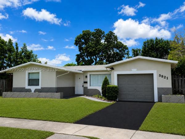 Sunrise Golf Village, 5821 NW 12th Ct, Sunrise, Florida 33313, image 1