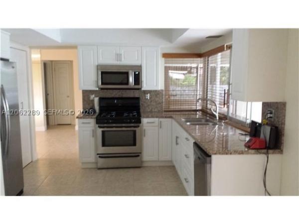 Sunrise Golf Village, 8430 NW 25th Ct #., Sunrise, Florida 33322, image 1
