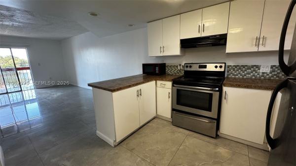 Vista Alegre Townhomes, 5530 W 26th Ct #210, Hialeah, Florida 33016, image 2