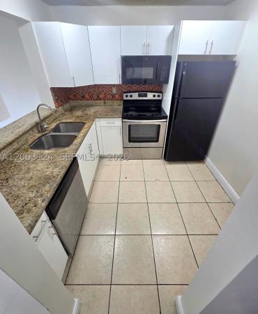 482 NW 165th Street Rd #A-306, Unincorporated Dade County, Florida 33169, image 1