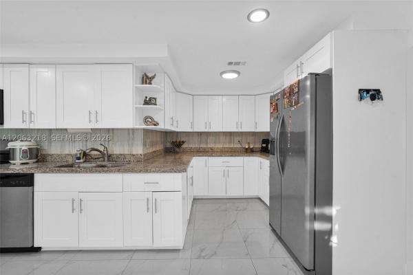 Sun Tan Village, 831 E 10th Pl, Hialeah, Florida 33010, image 2