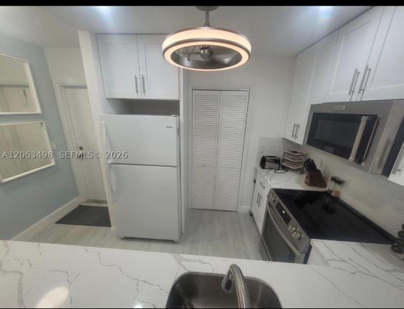 Paradise Harbour, 300 Golden Isles Dr #217, Hallandale Beach, Florida 33009, image 1