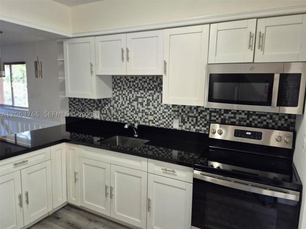 Wimbledon At Jacaranda, 214 Wimbledon Lake Dr #57, Plantation, Florida 33324, image 1