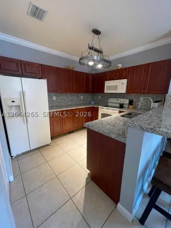 The Shores At Isles Of Bayshore, 9217 SW 227th St #12, Cutler Bay, Florida 33190, image 1