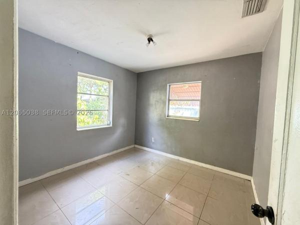 Belford Carr, 951 NE 157th Ter, North Miami Beach, Florida 33162, image 2