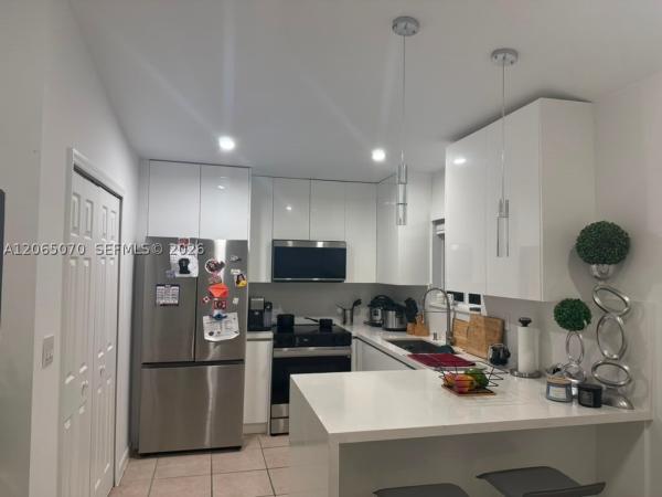 Monterey At Malibu Bay, 945 NE 33rd Ter #201, Homestead, Florida 33033, image 1