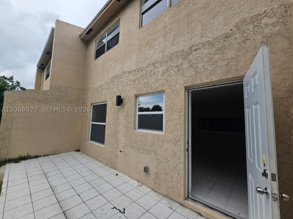 Dennis Townhouses, 954 SW 74th Ave, North Lauderdale, Florida 33068, image 1