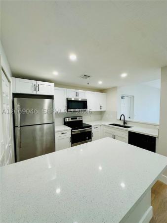 The Courts At Doral Isles, 6560 NW 114th Ave #523, Doral, Florida 33178, image 1