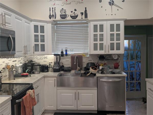Miami Modern Manors, 560 NW 184th Ter, Miami Gardens, Florida 33169, image 1