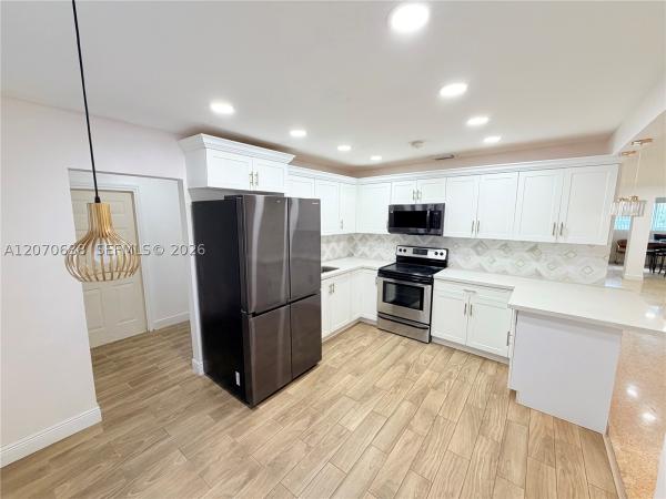 Bell Gardens, 18711 NW 24th Ave, Miami Gardens, Florida 33056, image 3