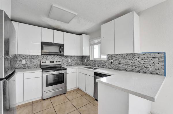 1154 NW 103rd St #1, Unincorporated Dade County, Florida 33150, image 2