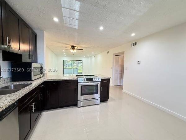 Lakes Of Carriage Hills, 6095 N Sabal Palm Blvd #103, Tamarac, Florida 33319, image 2