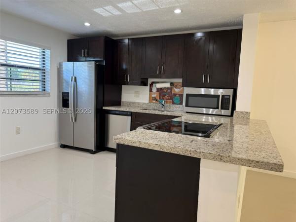 Lakes Of Carriage Hills, 6095 N Sabal Palm Blvd #103, Tamarac, Florida 33319, image 1