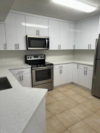 Edgewater, 8801 Wiles Rd #103, Coral Springs, Florida 33067, image 1