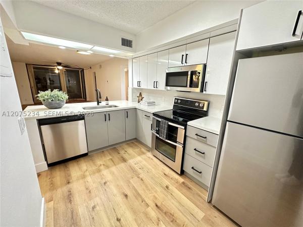 Lake Pointe, 202 Lake Pointe Dr #104, Oakland Park, Florida 33309, image 2