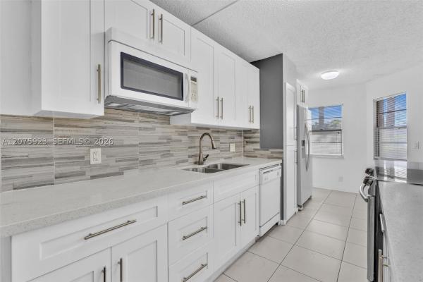 Cambridge At Century Village, 1300 SW 124th Ter #105P, Pembroke Pines, Florida 33027, image 3