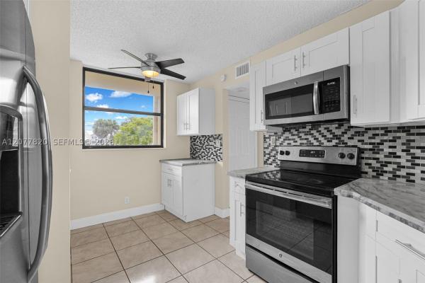 Lake Emerald, 117 Lake Emerald Dr #204, Oakland Park, Florida 33309, image 1
