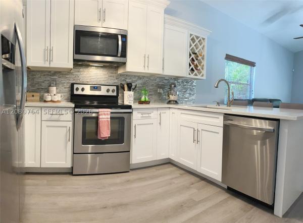 Bay Estates At Rainbow Lakes, 6384 Lansdowne Cir, Boynton Beach, Florida 33472, image 3