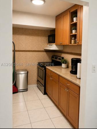 Sutton House, 11855 NE 19th Dr #49, North Miami, Florida 33181, image 2
