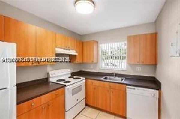 Townhouses Of Plantation, 4841 NW 9th Dr, Plantation, Florida 33317, image 1