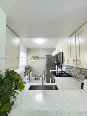 1112 NW 125th Pl #102, Unincorporated Dade County, Florida 33182, image 2