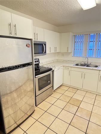 Westlawn, 5919 SW 4th St, Miami, Florida 33144, image 1