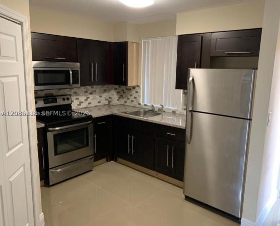 6175 NW 186th St #305, Hialeah, Florida 33015, image 1