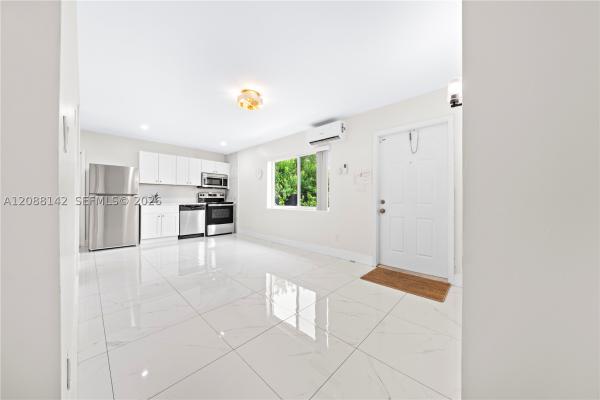 Villa Theo Townhouse, 612 NW 10th Ter #A-C, Fort Lauderdale, Florida 33311, image 1