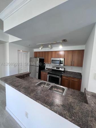Poinciana Place, 5980 W Sample Rd #301, Coral Springs, Florida 33067, image 1
