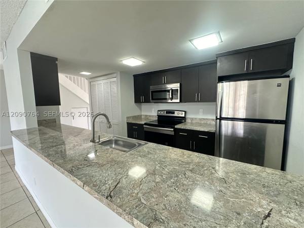 Woodscape Townhomes, 6848 SW 37th St #10-D, Miramar, Florida 33023, image 1