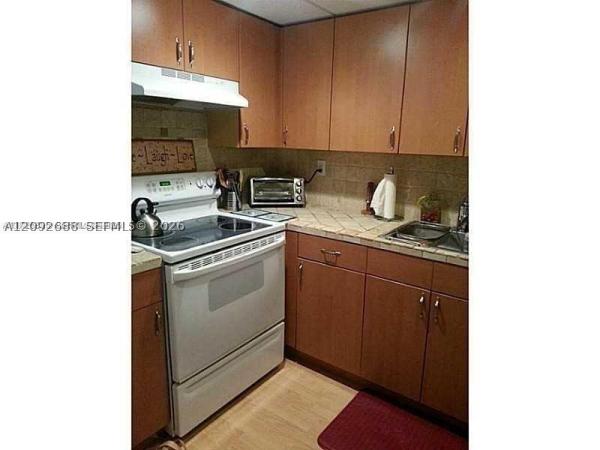 Monterey Gardens Of Pinecrest, 8617 SW 68th Ct #22, Pinecrest, Florida 33156, image 1