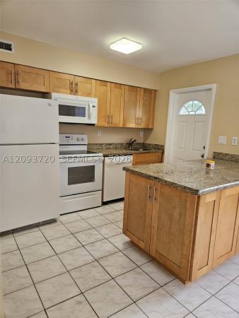 Central Oakland Park, 1008 NE 34th Ct #B, Oakland Park, Florida 33334, image 1