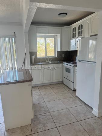 Suzanne Plaza, 7910 Taft St #309, Pembroke Pines, Florida 33024, image 1