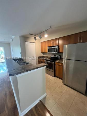 Poinciana Place, 5940 W Sample Rd #304, Coral Springs, Florida 33067, image 1