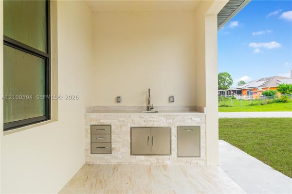415 Chamonix Ave S, Lehigh Acres, Florida 33974, image 1