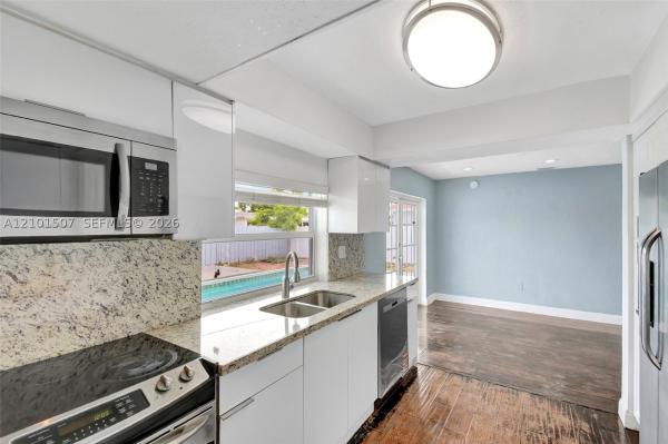 Sunrise Golf Village, 8960 Sunset Strip, Sunrise, Florida 33322, image 1