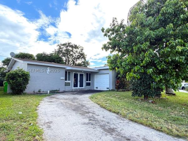 Sunrise Golf Village, 8590 NW 25th Ct, Sunrise, Florida 33322, image 1