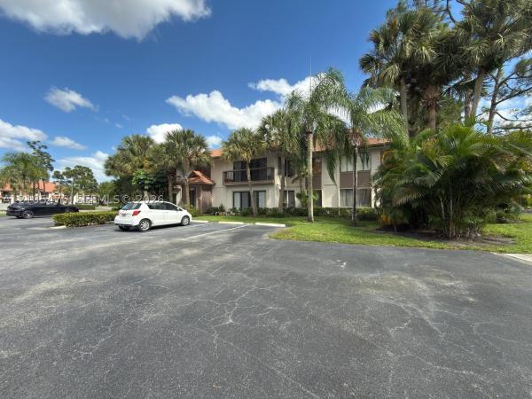 Dunbar Woods, 1102 Duncan Cir #104, Palm Beach Gardens, Florida 33418, image 1