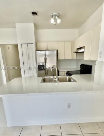 Shoma Homes At Country Club, 7080 NW 177th St #209-13, Hialeah, Florida 33015, image 1