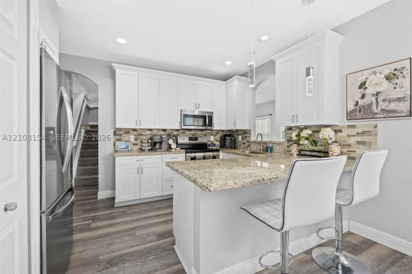 Kensington Manor, 10541 NW 56th Pl, Coral Springs, Florida 33076, image 1