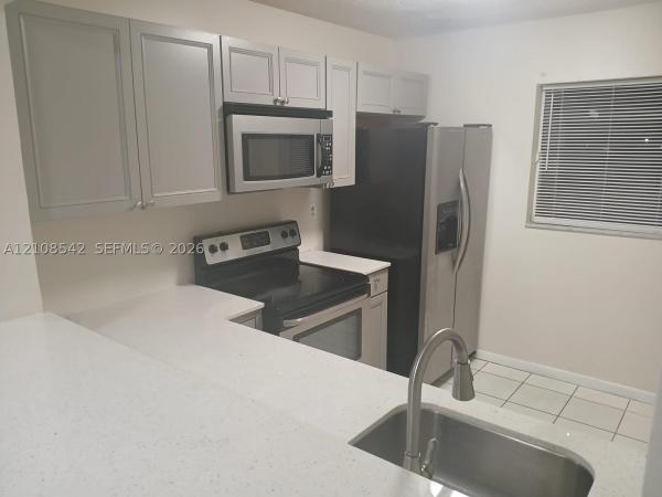 Miramar Club, 3396 Foxcroft Rd #106, Miramar, Florida 33025, image 1