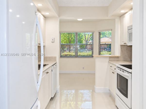 Lancaster At Century Village, 500 SW 130th Ter #109A, Pembroke Pines, Florida 33027, image 1