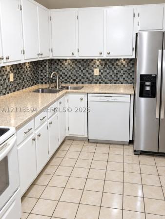 Manor Grove Village, 124 NE 19th Ct #108B, Wilton Manors, Florida 33305, image 1