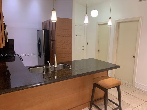 Doral Park Country Club Villas, 4910 NW 102nd Ave #201-8, Doral, Florida 33178, image 1