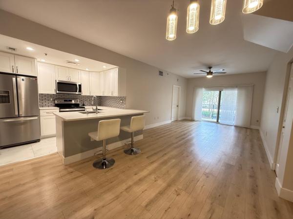Poinciana Place, 5860 W Sample Rd #202, Lake Worth, Florida 33067, image 1