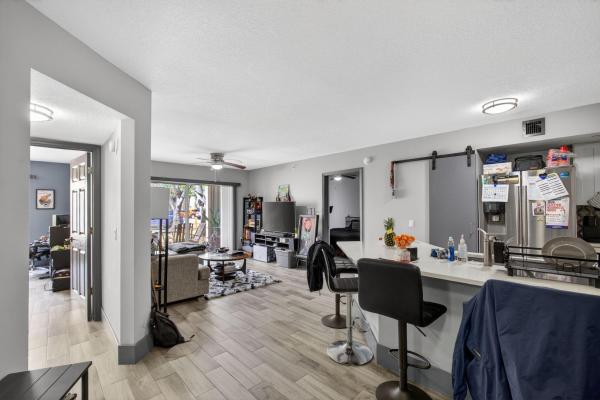 Emerald Isle At Laguna Lakes, 4211 San Marino Blvd #105, West Palm Beach, Florida 33409, image 1