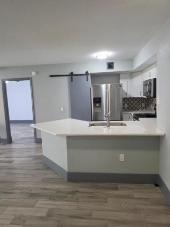 Emerald Isle At Laguna Lakes, 4211 San Marino Blvd #105, West Palm Beach, Florida 33409, image 2