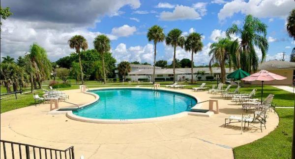 Greenway Village North, 61 East Ct, Royal Palm Beach, Florida 33411, image 1