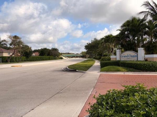 The Grand Oasis, 5661 Riverside Dr #203B7, Coral Springs, Florida 33067, image 1